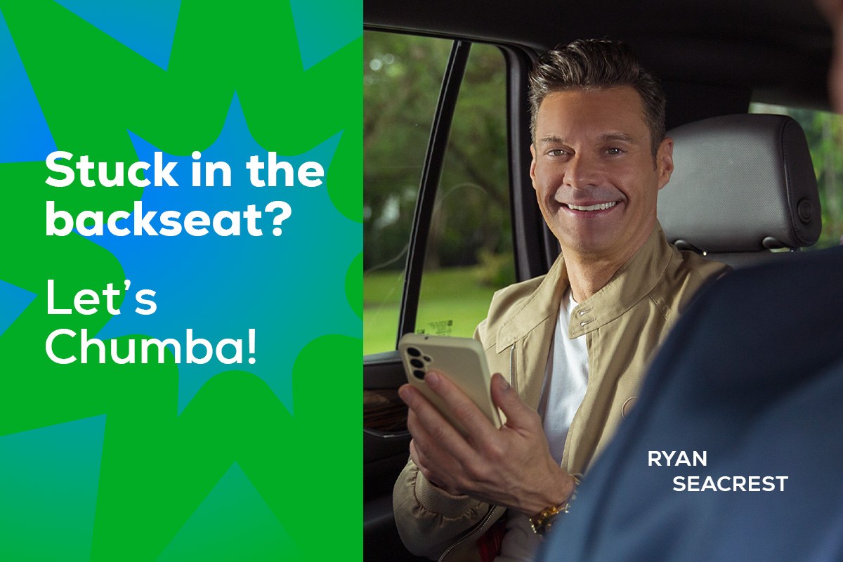 Chumba Casino email header: Ryan Seacrest in the back seat of a car with his phone. Stuck in the backseat? Let’s Chumba!